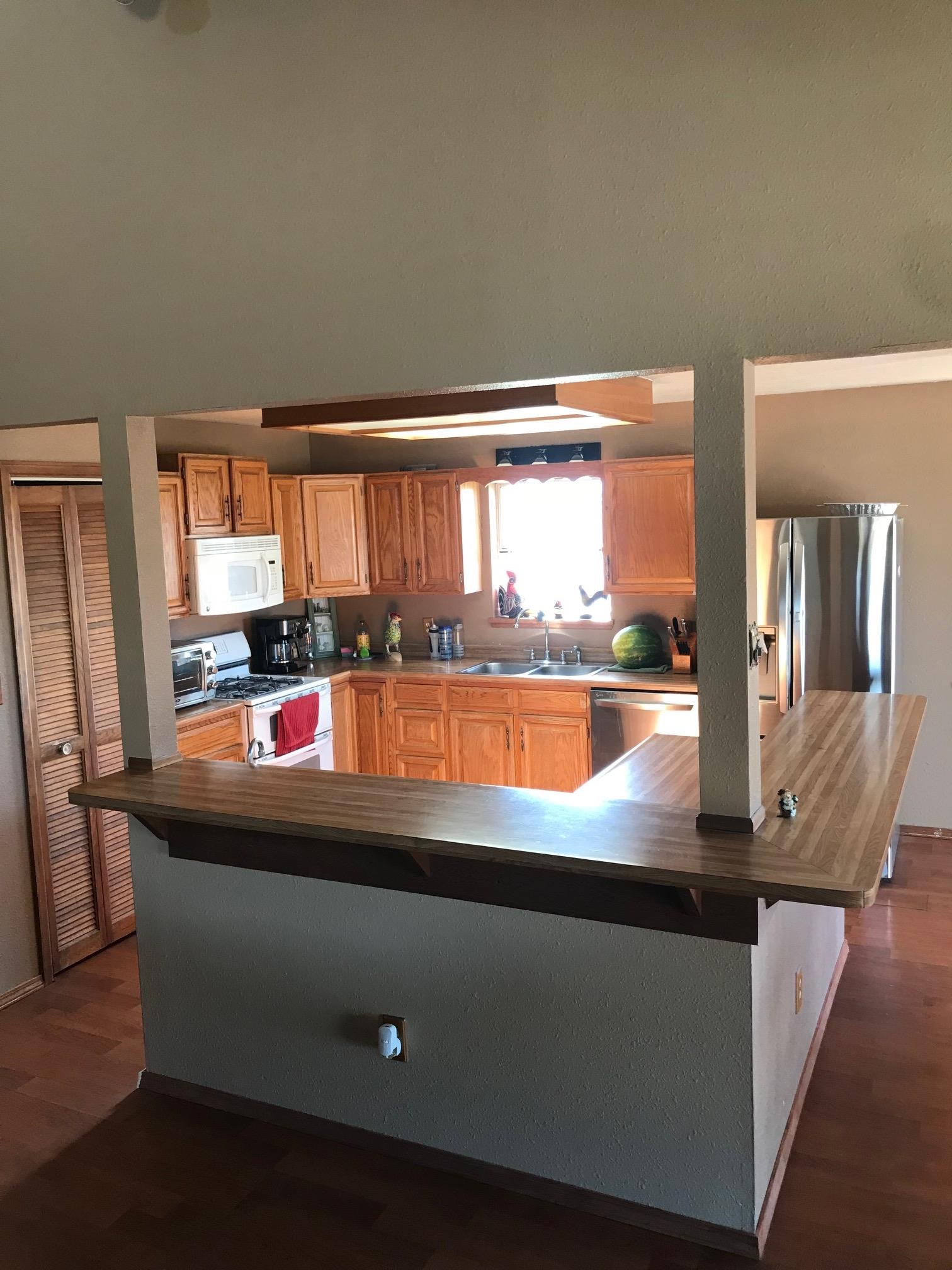 1268-17 17 1/2 Road Fruita, CO 81521 - Photo 8 of 40 a view of kitchen with kitchen island and stainless steel appliances