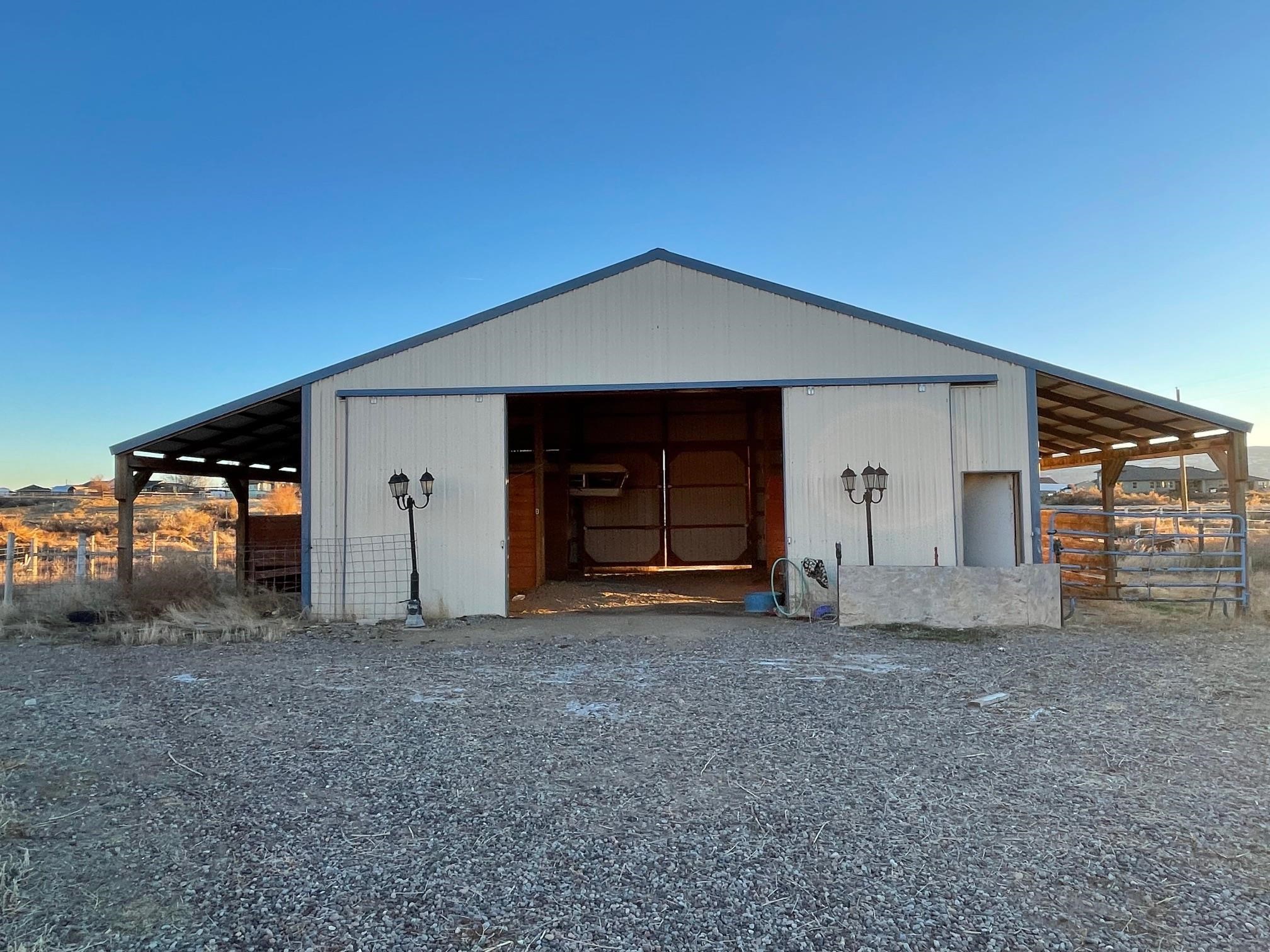 1268-17 17 1/2 Road Fruita, CO 81521 - Photo 9 of 40 a view of empty room with garage and window