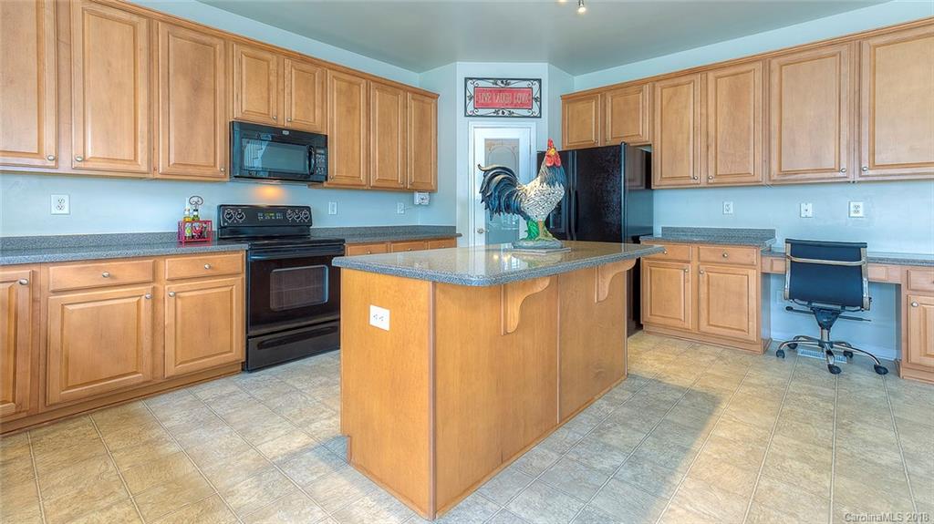 5312 Conant Circle Fort Mill, SC 29708 - Photo 14 of 25 a kitchen with a sink cabinets and appliances