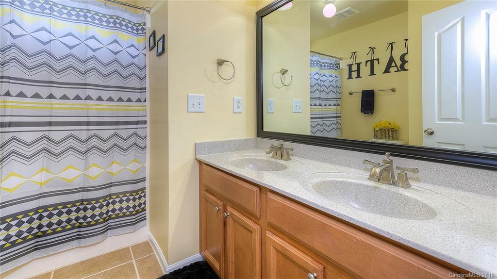 5312 Conant Circle Fort Mill, SC 29708 - Photo 16 of 25 a bathroom with a sink and a mirror