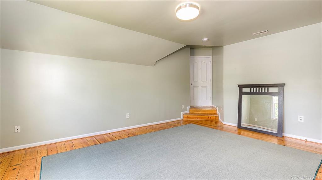 5312 Conant Circle Fort Mill, SC 29708 - Photo 20 of 25 a room with a window and stairs