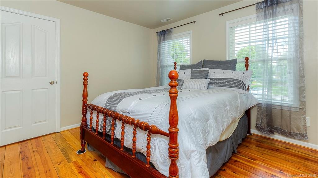5312 Conant Circle Fort Mill, SC 29708 - Photo 22 of 25 a bed sitting in a bedroom next to a window