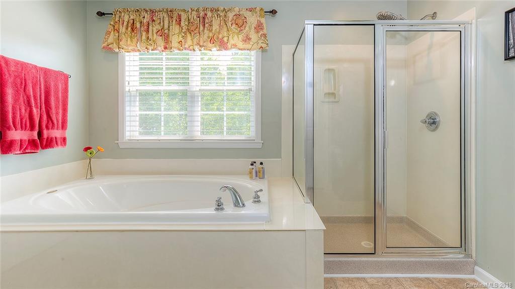 5312 Conant Circle Fort Mill, SC 29708 - Photo 24 of 25 a white bath tub sitting next to a window