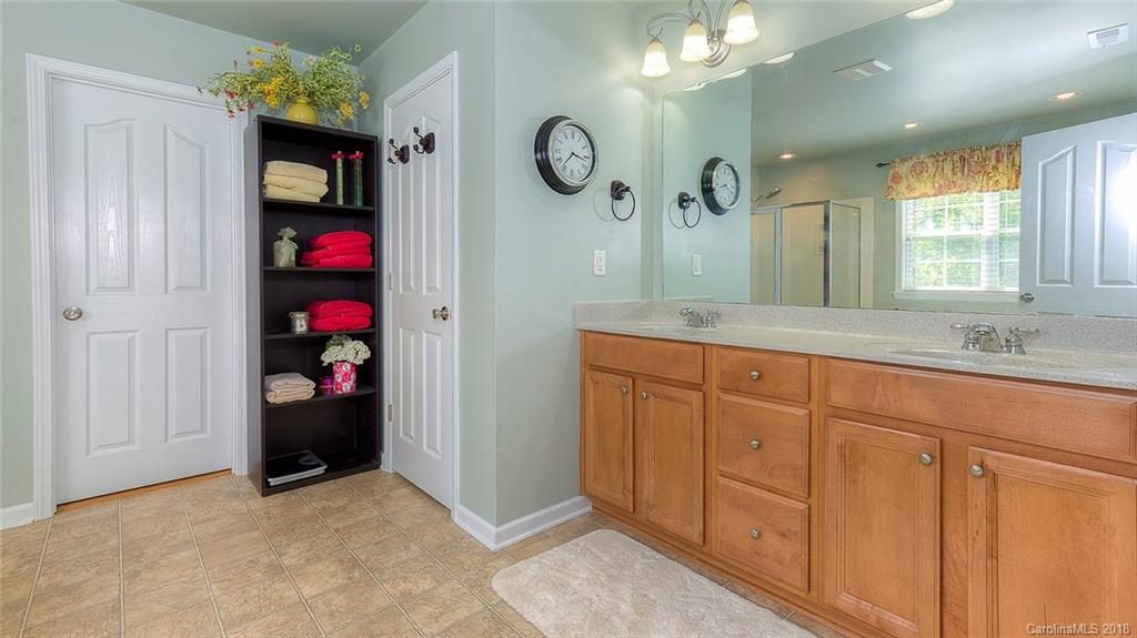 5312 Conant Circle Fort Mill, SC 29708 - Photo 25 of 25 a very nice looking room with a mirror and a ceiling fan