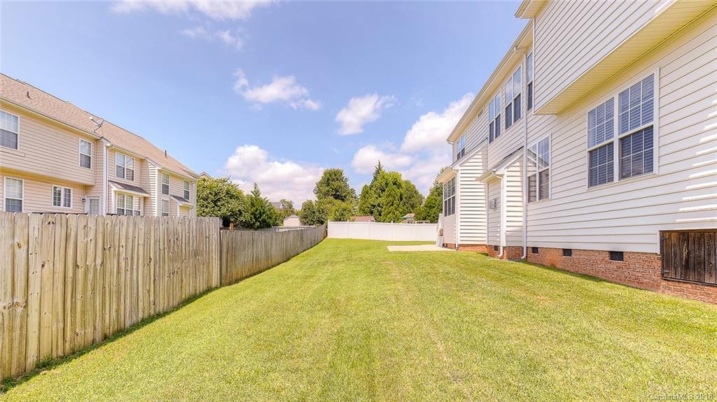5312 Conant Circle Fort Mill, SC 29708 - Photo 4 of 25 a view of a house with a backyard