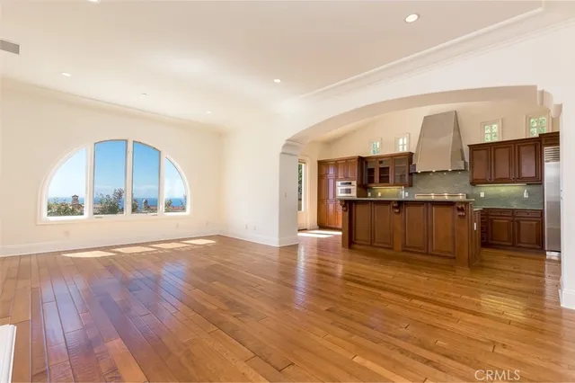 a view of kitchen with wooden floor