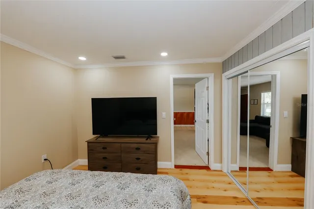 a view of a room with gym equipment and windows