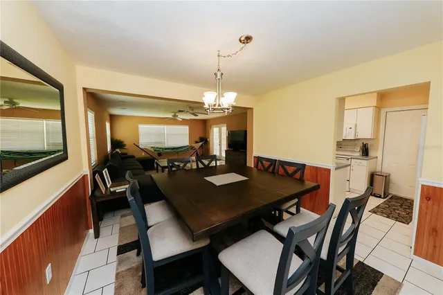 a kitchen with a sink a stove and refrigerator