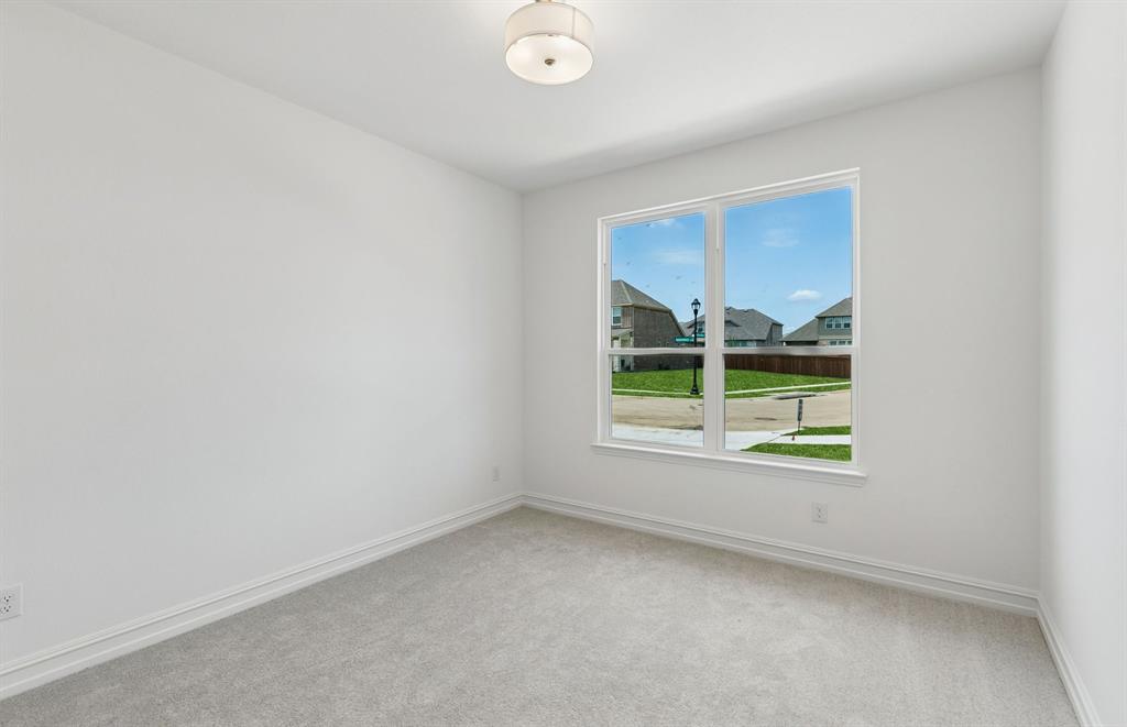 11220 Abbotsbury Road Fort Worth, TX 76052 - Photo 14 of 32 an empty room with a window