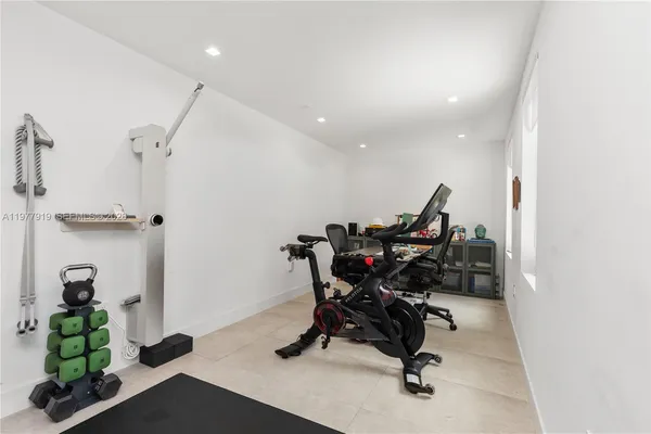 a utility room with sink dryer and washer