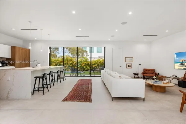 a living room with furniture and a table