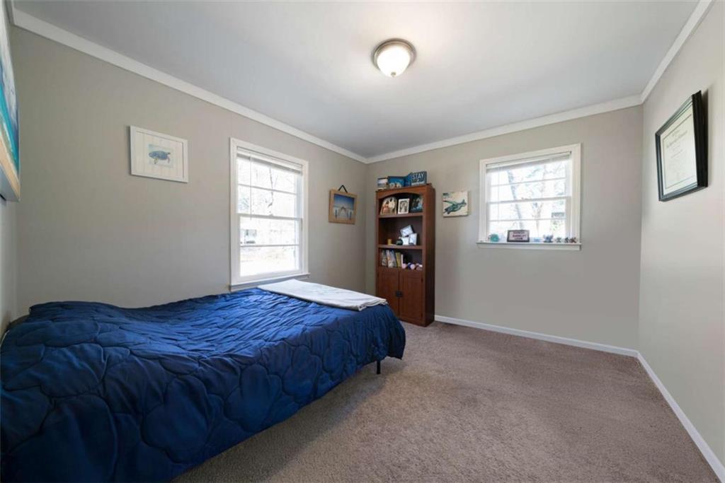 6 Nottingham Way Northeast Rome, GA 30161 - Photo 11 of 16 a bedroom with a bed and a window