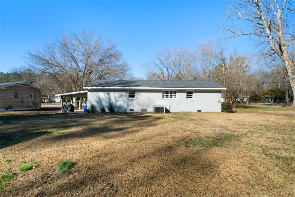 6 Nottingham Way Northeast Rome, GA 30161 - Photo 14 of 16 a view of a house with a yard covered in snow