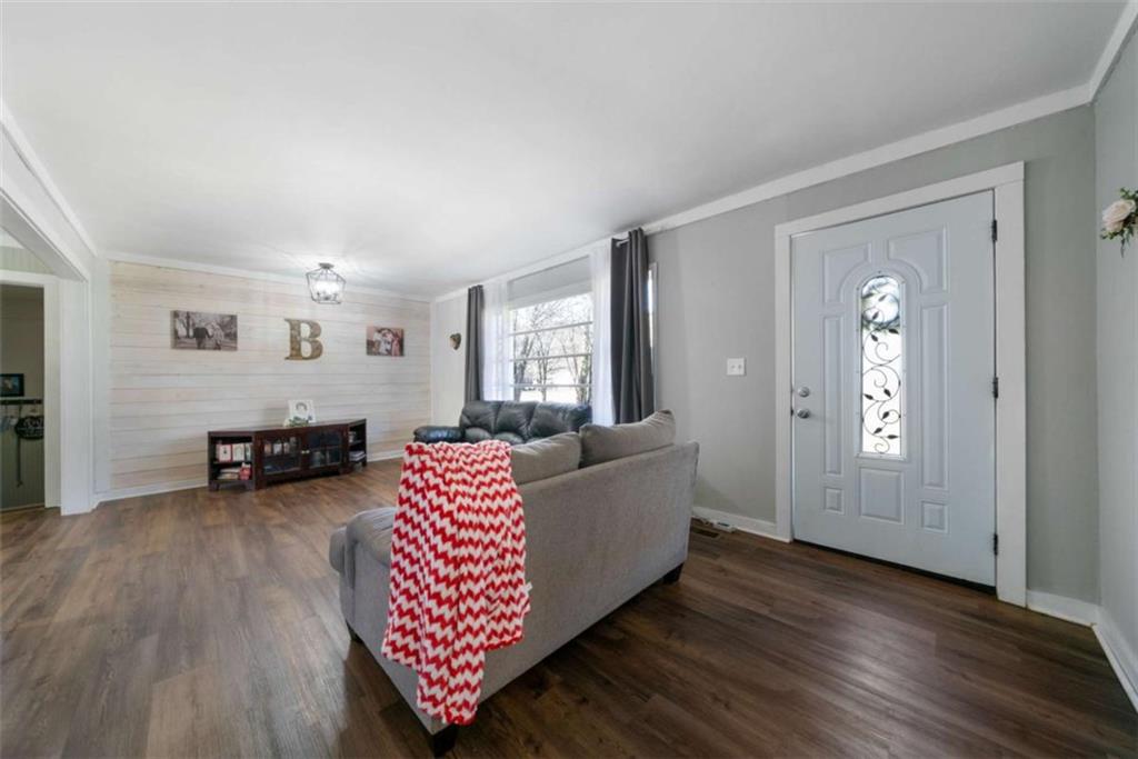 6 Nottingham Way Northeast Rome, GA 30161 - Photo 5 of 16 a living room with furniture and wooden floor