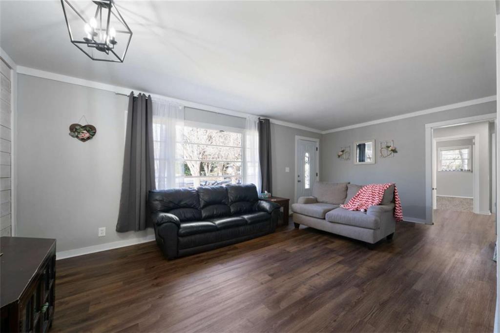 6 Nottingham Way Northeast Rome, GA 30161 - Photo 6 of 16 a living room with furniture and wooden floor