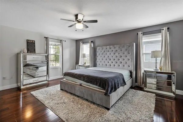 a large kitchen with kitchen island a sink stainless steel appliances and cabinets