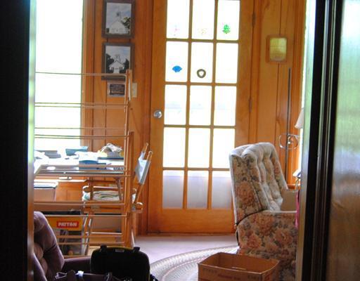 18 Mount Percival Road Northport, ME 04849 - Photo 7 of 8 Living Room. Hal way in to livingroom