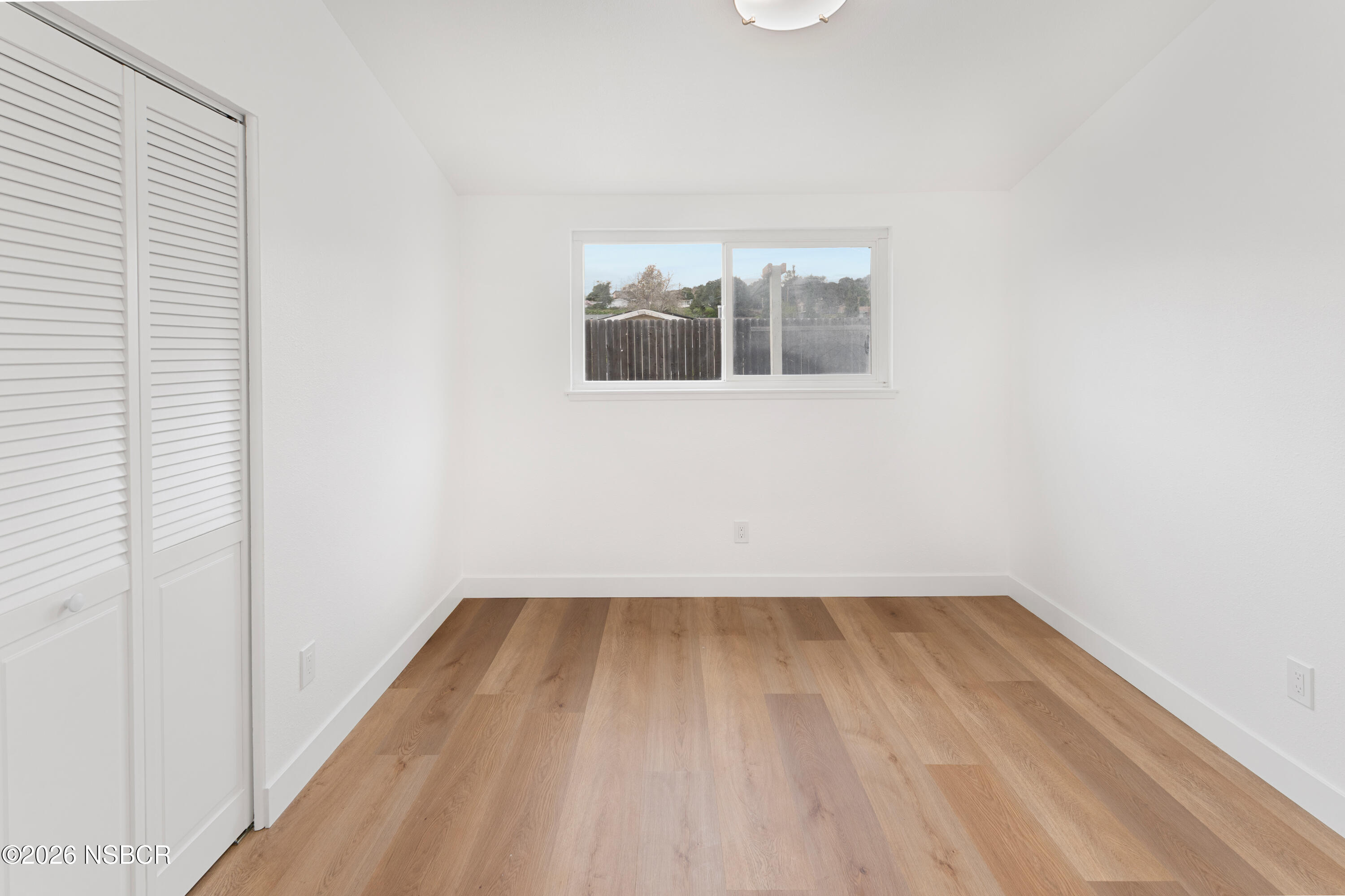 3851 Via Lato Lompoc, CA 93436 - Photo 14 of 19 a view of a small space with wooden floor and a window