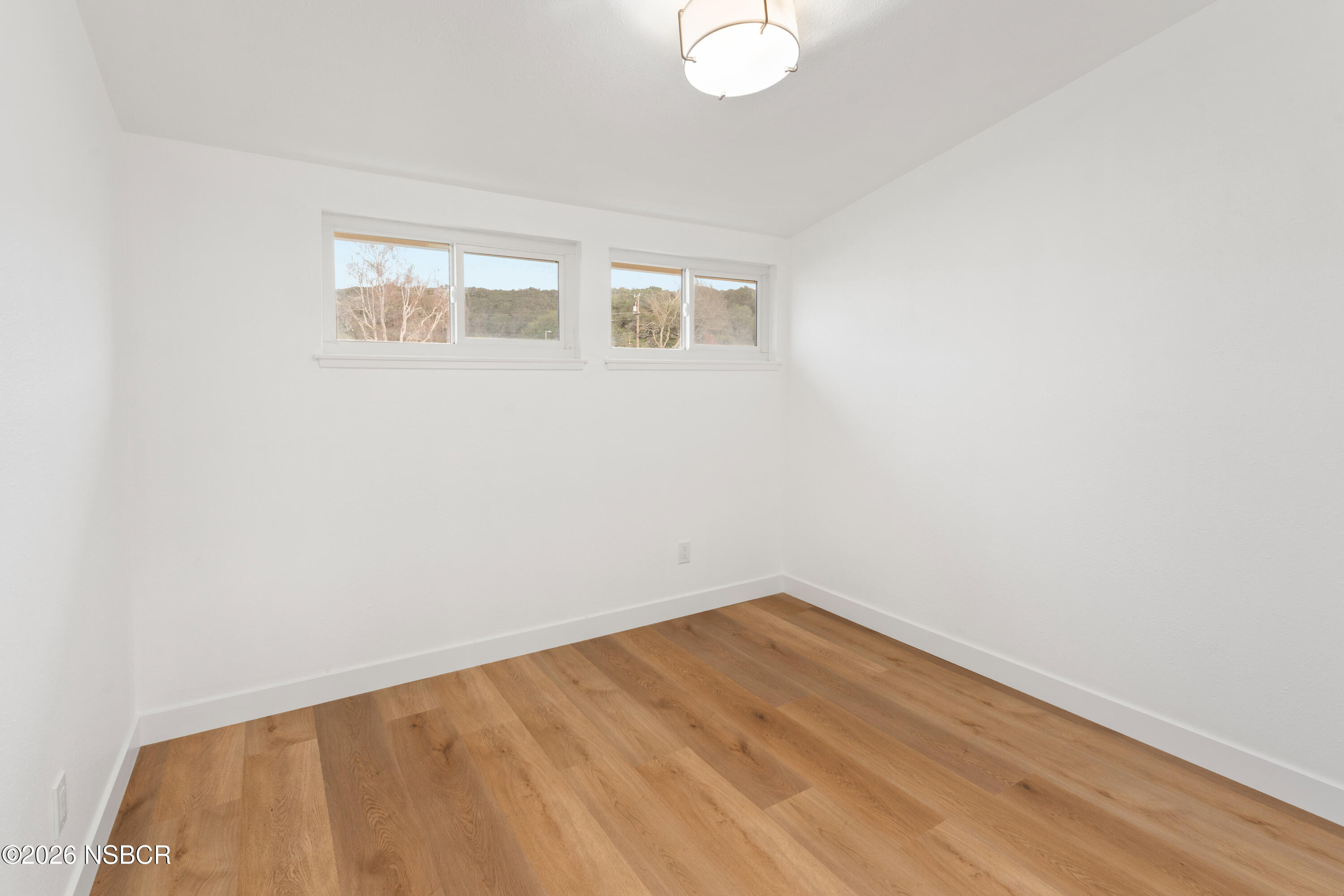 3851 Via Lato Lompoc, CA 93436 - Photo 16 of 19 a view of empty room with wooden floor
