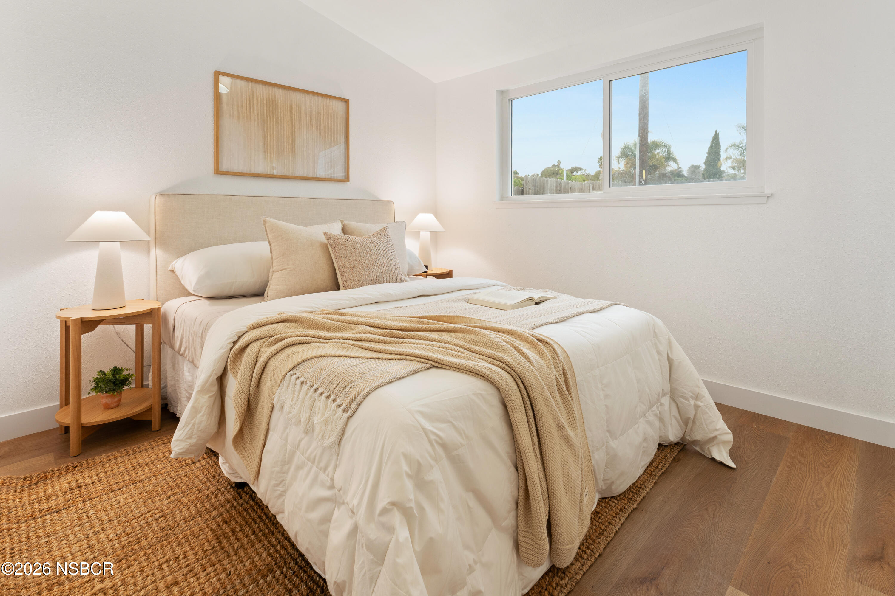 3851 Via Lato Lompoc, CA 93436 - Photo 17 of 19 a bed sitting in a bedroom next to a lamp