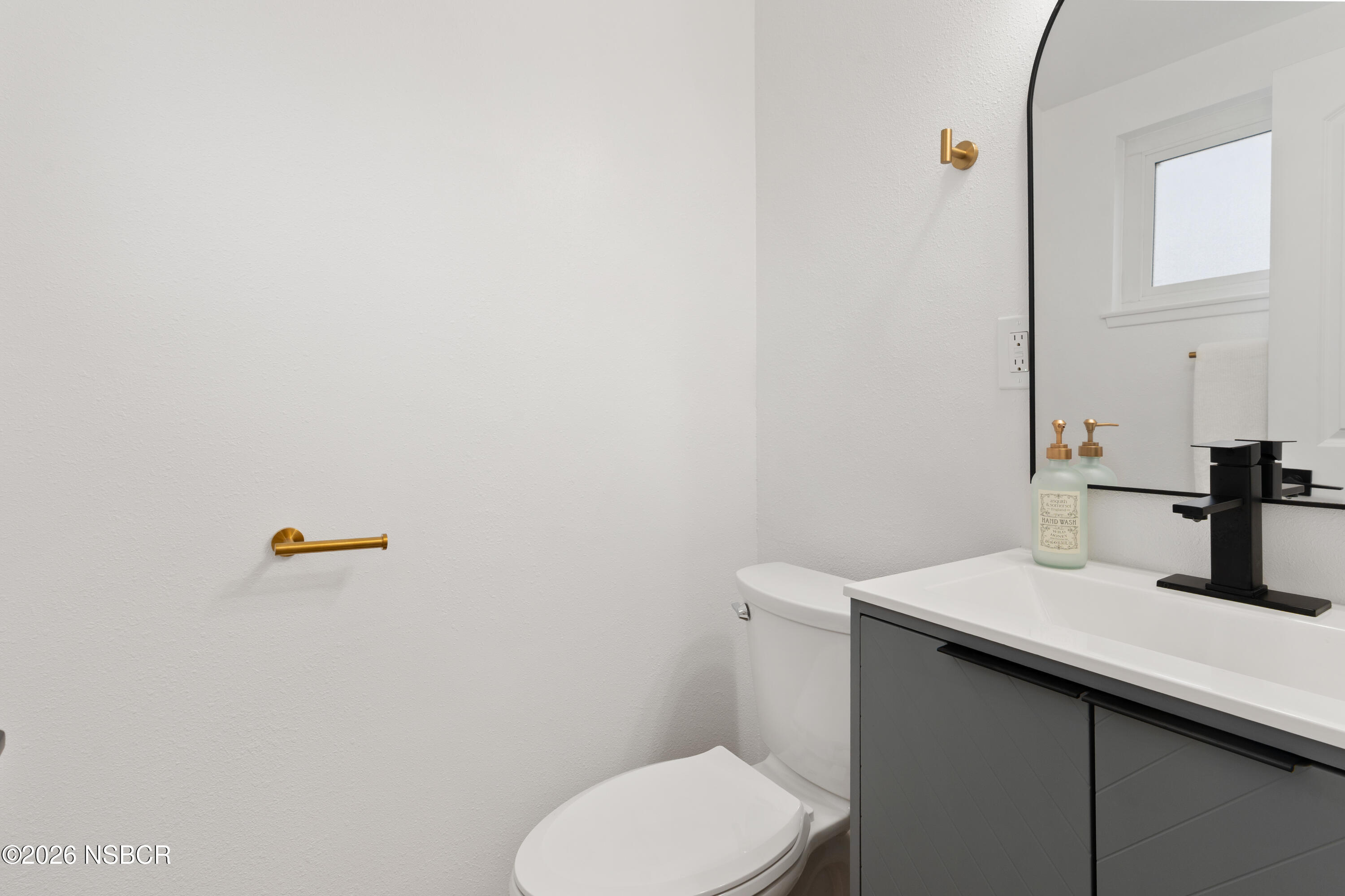3851 Via Lato Lompoc, CA 93436 - Photo 19 of 19 a bathroom with a sink a toilet and mirror