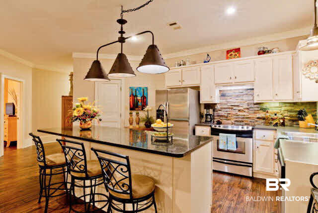 25773 Canal Road, Unit 26 Orange Beach, AL 36561 - Photo 14 of 42 Custom Light above bar conveys with the sale