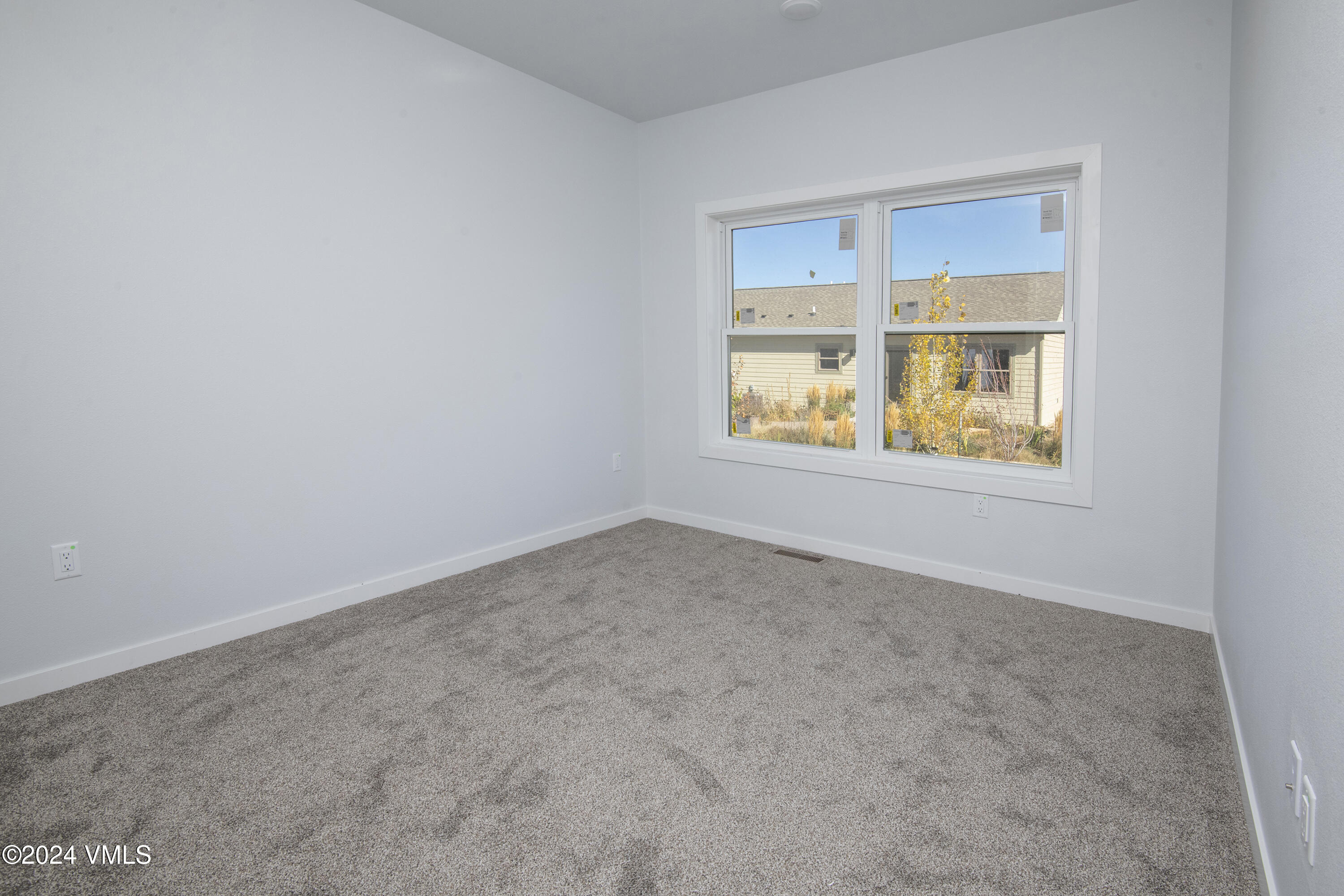 590 Blackhawk Road Gypsum, CO 81637 - Photo 32 of 42 an empty room with a window