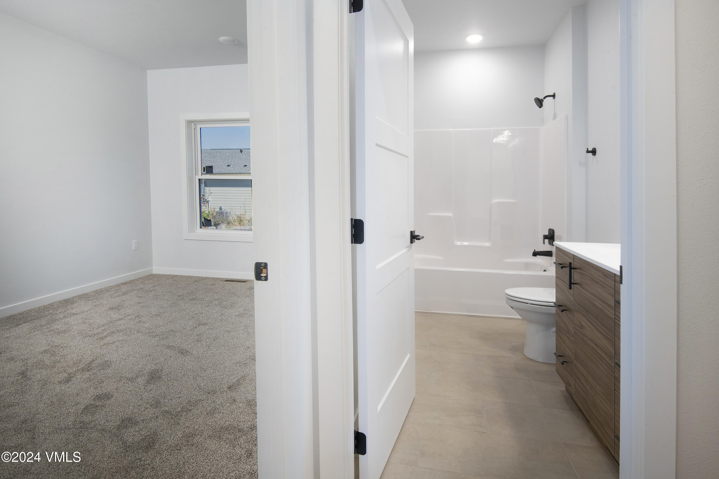 590 Blackhawk Road Gypsum, CO 81637 - Photo 33 of 42 a bathroom with a sink and toilet