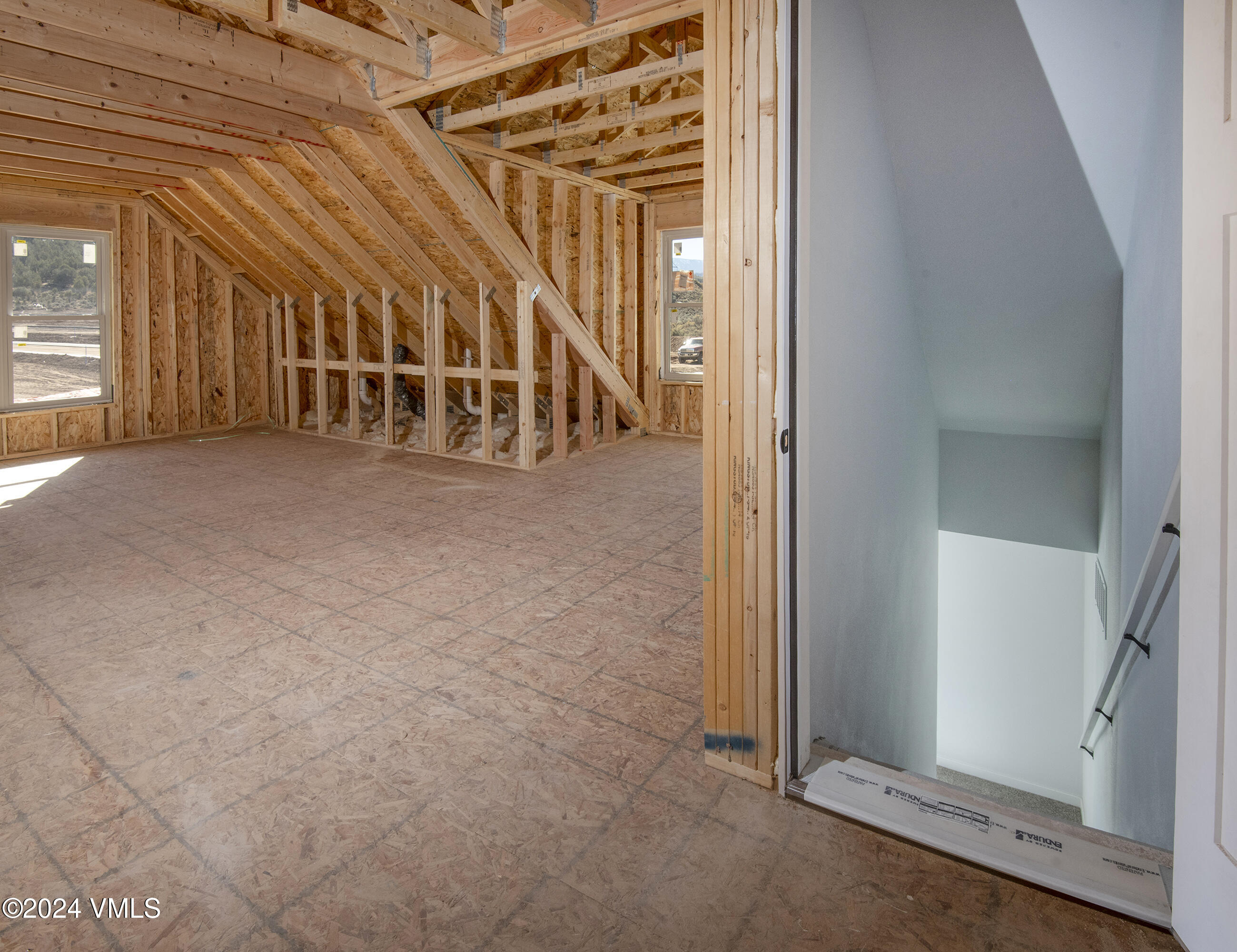 590 Blackhawk Road Gypsum, CO 81637 - Photo 40 of 42 wooden floor in an empty room