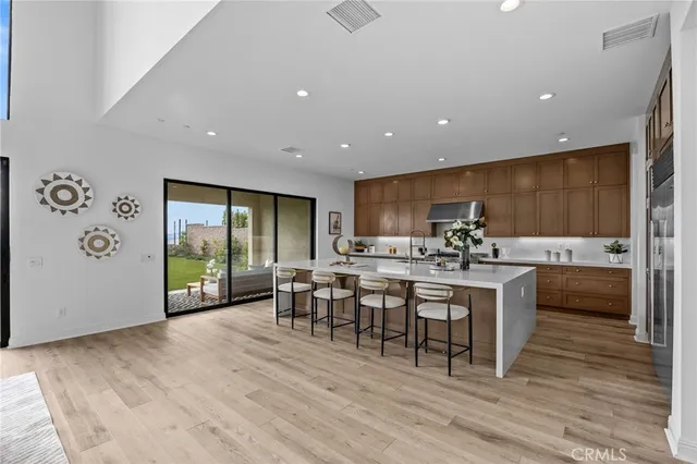a kitchen with a table and chairs
