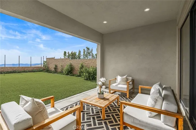 a view of a room with lounge chairs