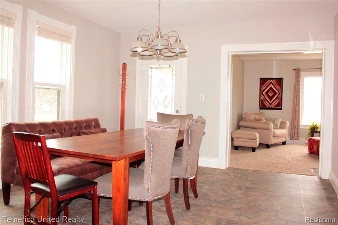 1076 Steiner Road Monroe, MI 48162 - Photo 8 of 22 Large dining room with direct exterior access