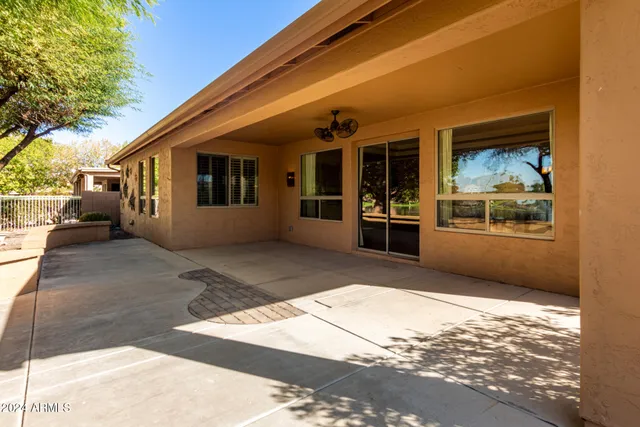 a view of a lake with houses in the background