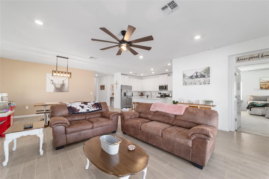4012 Northeast 33rd Avenue Ocala, FL 34479 - Photo 15 of 77 a living room with furniture and a large window