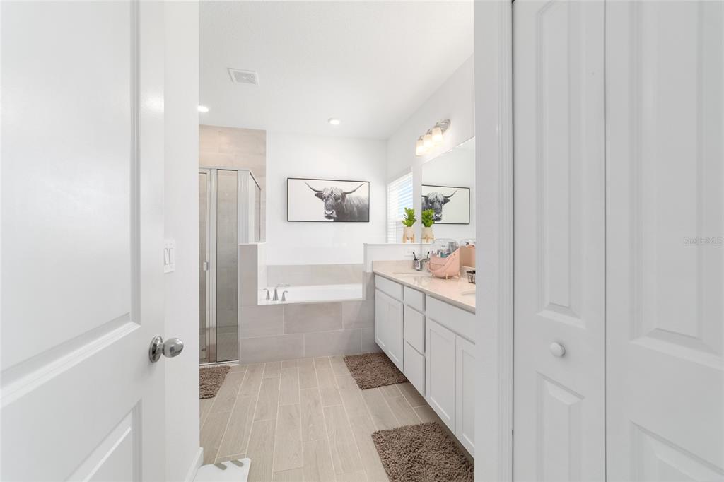 4012 Northeast 33rd Avenue Ocala, FL 34479 - Photo 33 of 77 a bathroom with a granite countertop sink and a mirror