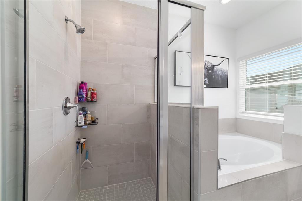 4012 Northeast 33rd Avenue Ocala, FL 34479 - Photo 36 of 77 a bathroom with a bathtub and shower