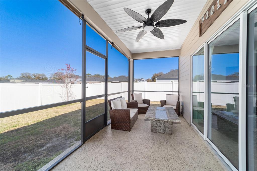 4012 Northeast 33rd Avenue Ocala, FL 34479 - Photo 54 of 77 a living room with furniture and a large window