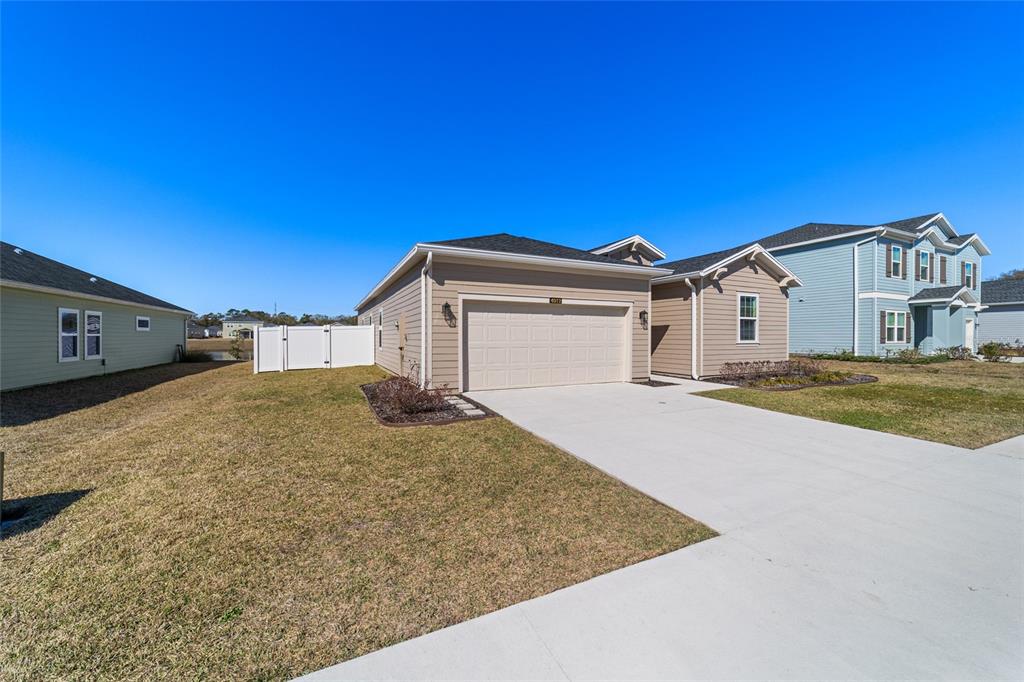 4012 Northeast 33rd Avenue Ocala, FL 34479 - Photo 57 of 77 a front view of a house with a yard