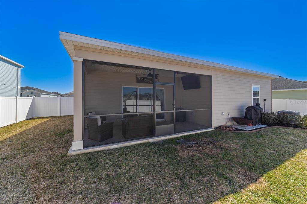 4012 Northeast 33rd Avenue Ocala, FL 34479 - Photo 60 of 77 a view of a backyard with furniture and a yard