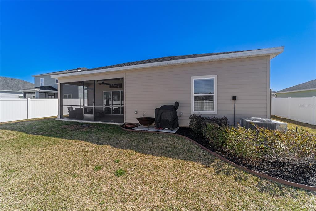 4012 Northeast 33rd Avenue Ocala, FL 34479 - Photo 62 of 77 a view of a house with backyard and garden