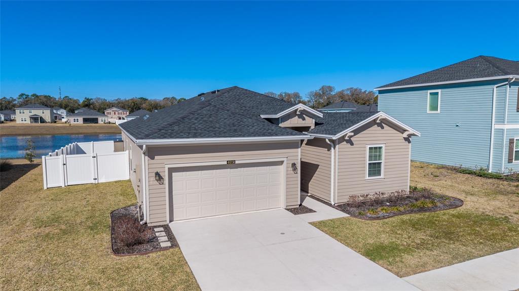4012 Northeast 33rd Avenue Ocala, FL 34479 - Photo 66 of 77 front view of a house with a yard