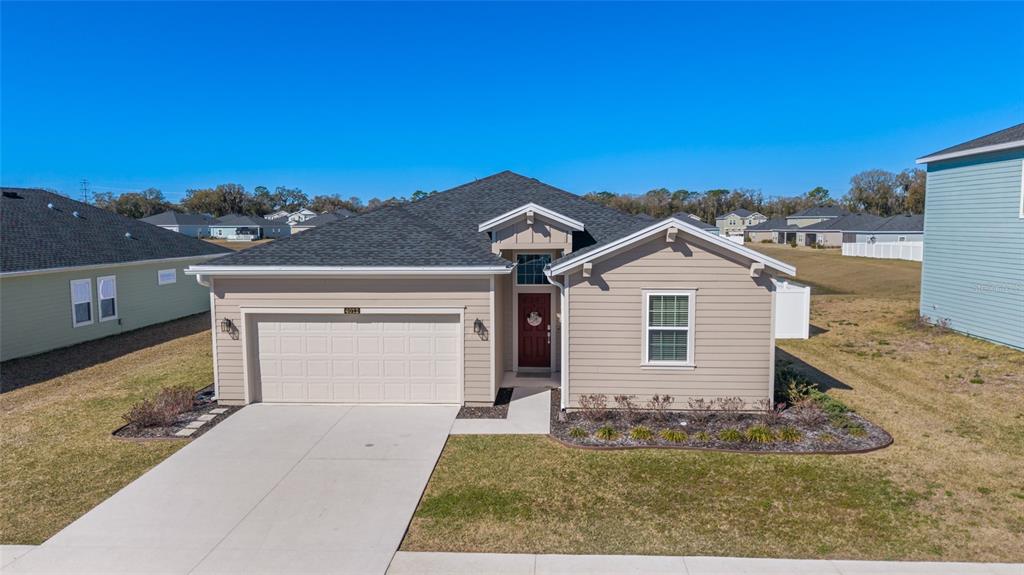 4012 Northeast 33rd Avenue Ocala, FL 34479 - Photo 67 of 77 front view of a house with a yard