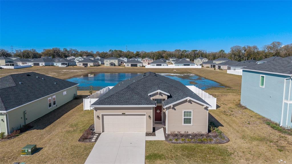 4012 Northeast 33rd Avenue Ocala, FL 34479 - Photo 69 of 77 an aerial view of a house with a yard