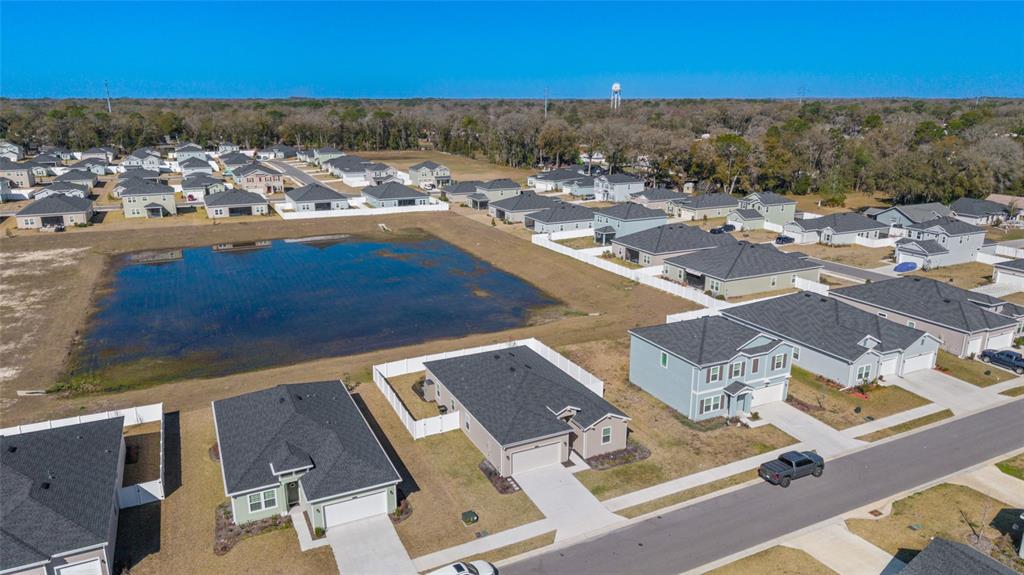 4012 Northeast 33rd Avenue Ocala, FL 34479 - Photo 70 of 77 an aerial view of residential houses with outdoor space