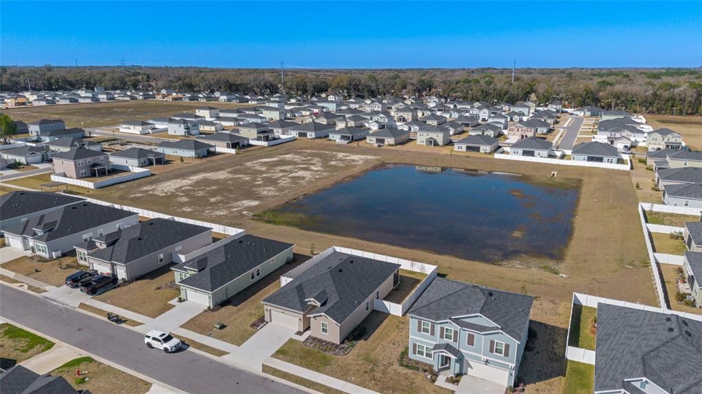 4012 Northeast 33rd Avenue Ocala, FL 34479 - Photo 71 of 77 an aerial view of residential houses with outdoor space