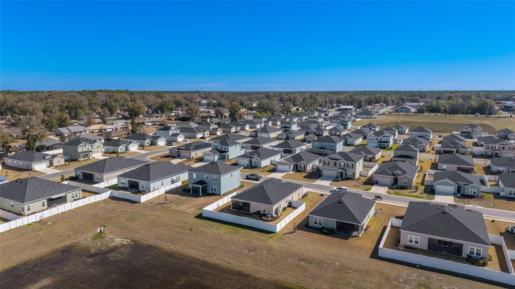 4012 Northeast 33rd Avenue Ocala, FL 34479 - Photo 73 of 77 an aerial view of residential houses with outdoor space