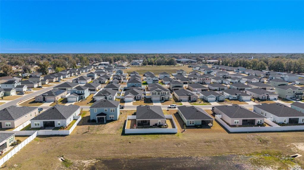 4012 Northeast 33rd Avenue Ocala, FL 34479 - Photo 74 of 77 an aerial view of residential houses with outdoor space