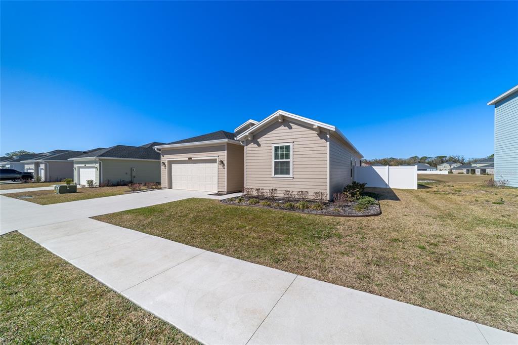 4012 Northeast 33rd Avenue Ocala, FL 34479 - Photo 76 of 77 a view of a house with a yard