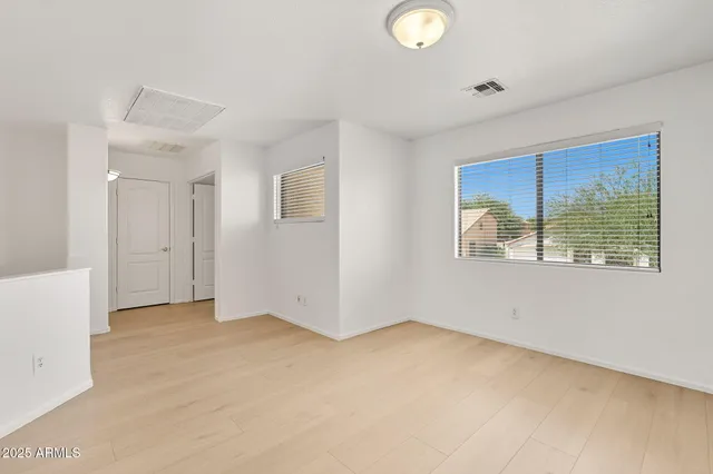 an empty room with windows