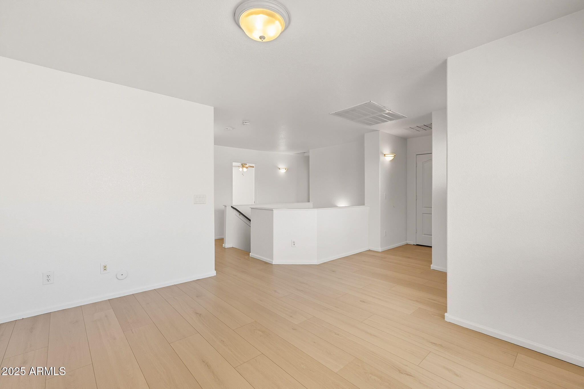 2503 West Gambit Trail Phoenix, AZ 85085 - Photo 29 of 54 a view of a kitchen with a dishwasher and white cabinets